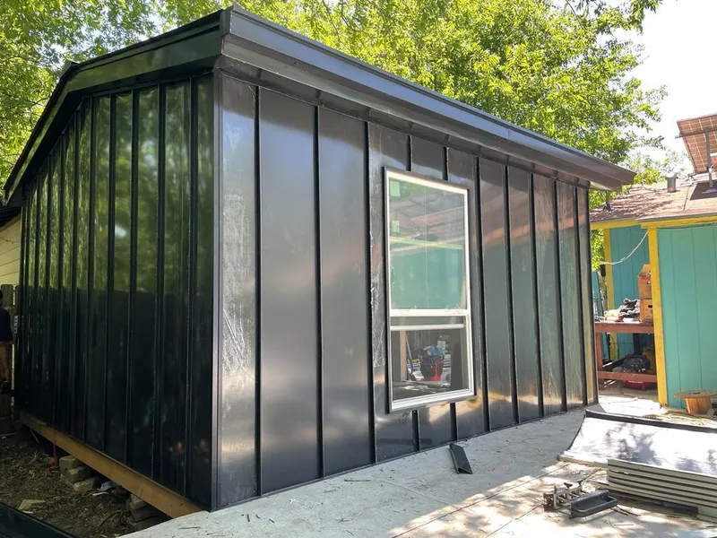 Black standing seam metal wall panels for Metal Roof Installation in Darien